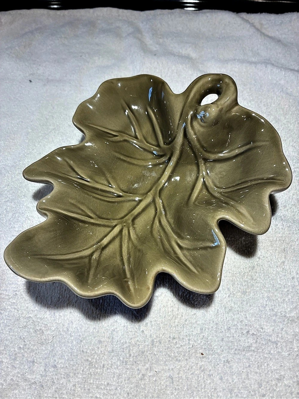 Vintage olive green ceramic leaf-shaped dish